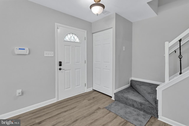 18721 Paprika Ct, Germantown, MD 20874 - foyer featuring stairway and wood finished floors