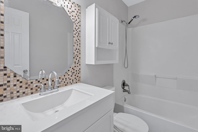 18721 Paprika Ct, Germantown, MD 20874 - full bathroom featuring tasteful backsplash, shower / bath combination, and vanity