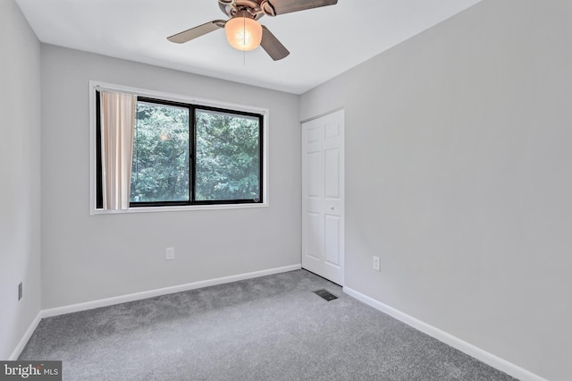 18721 Paprika Ct, Germantown, MD 20874 - carpeted spare room featuring a ceiling fan and baseboards
