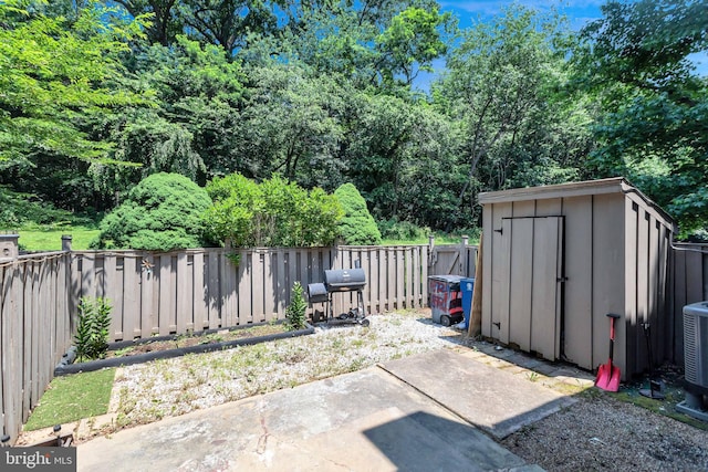 18721 Paprika Ct, Germantown, MD 20874 - fenced backyard with a storage shed and a patio area