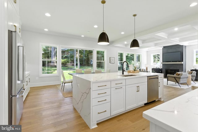 8202 Mockingbird Dr, Annandale, VA 22003 - kitchen with appliances with stainless steel finishes, recessed lighting, white cabinetry, light wood-type flooring, and open floor plan