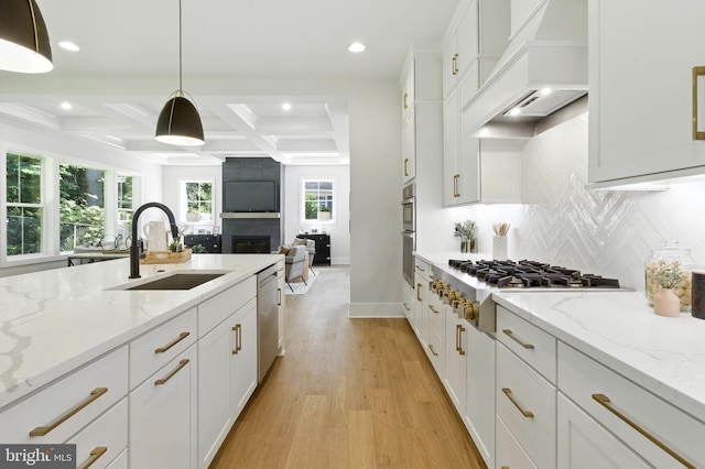 8202 Mockingbird Dr, Annandale, VA 22003 - kitchen with appliances with stainless steel finishes, coffered ceiling, custom exhaust hood, recessed lighting, and decorative backsplash