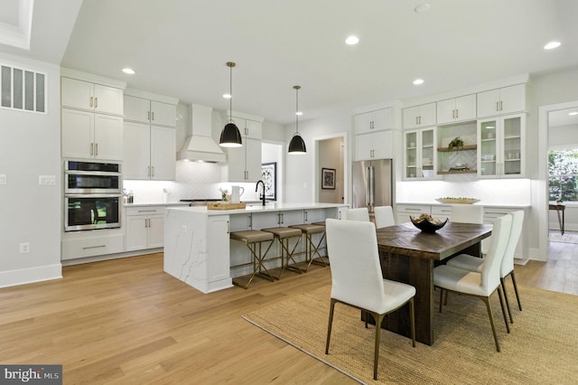 8202 Mockingbird Dr, Annandale, VA 22003 - dining room featuring recessed lighting and light wood-type flooring