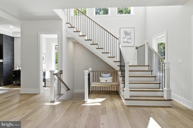 8202 Mockingbird Dr, Annandale, VA 22003 - staircase featuring plenty of natural light, wood finished floors, and recessed lighting