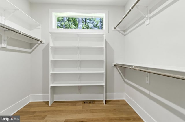 8202 Mockingbird Dr, Annandale, VA 22003 - spacious closet featuring wood finished floors