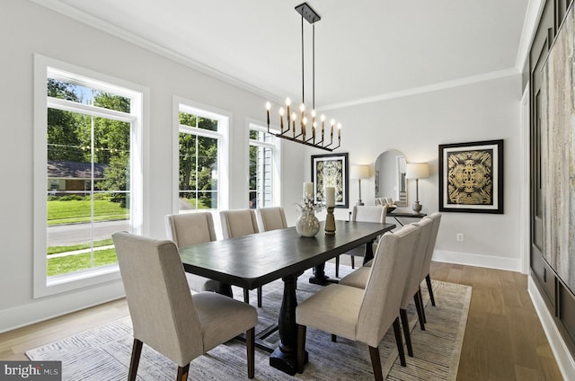 8202 Mockingbird Dr, Annandale, VA 22003 - dining room with arched walkways, ornamental molding, plenty of natural light, and wood finished floors