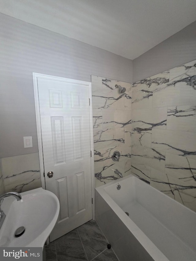 4735 Frankford Ave, Philadelphia, PA 19124 - bathroom with marble finish flooring and washtub / shower combination
