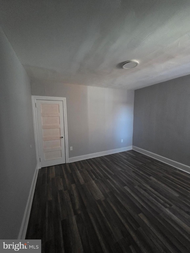 4735 Frankford Ave, Philadelphia, PA 19124 - empty room with dark wood-style flooring