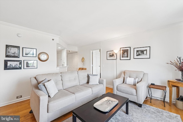 2001 Hamilton St Unit 1205, Philadelphia, PA 19130 - living room with crown molding and light wood-style flooring