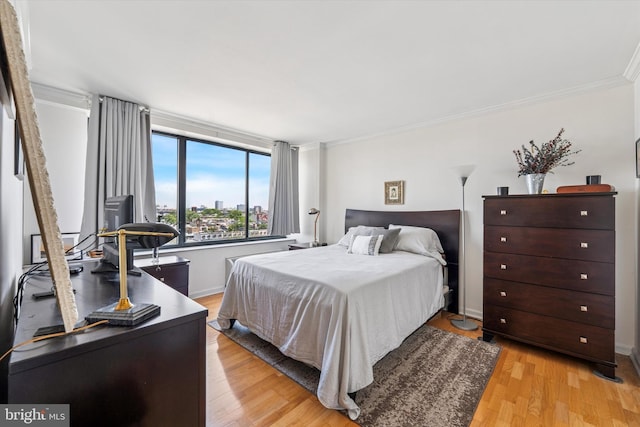 2001 Hamilton St Unit 1205, Philadelphia, PA 19130 - bedroom featuring crown molding and light wood-style flooring