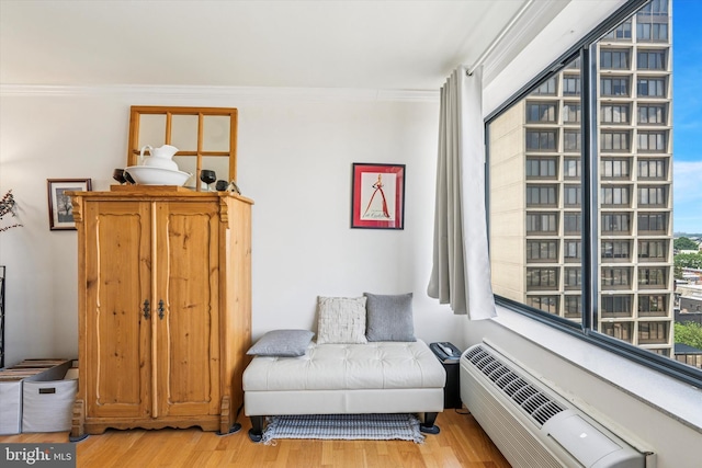 2001 Hamilton St Unit 1205, Philadelphia, PA 19130 - sitting room featuring crown molding and wood finished floors