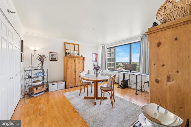 2001 Hamilton St Unit 1205, Philadelphia, PA 19130 - dining area with wood finished floors, ornamental molding, and a desk