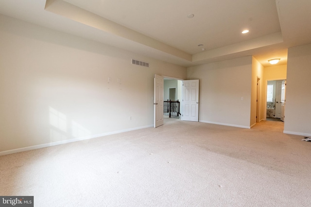 4251 Beech Dr, Nazareth, PA 18064 - unfurnished bedroom with a tray ceiling, light carpet, and recessed lighting