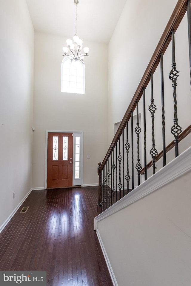 4251 Beech Dr, Nazareth, PA 18064 - foyer entrance featuring a chandelier, hardwood / wood-style floors, stairway, and a high ceiling