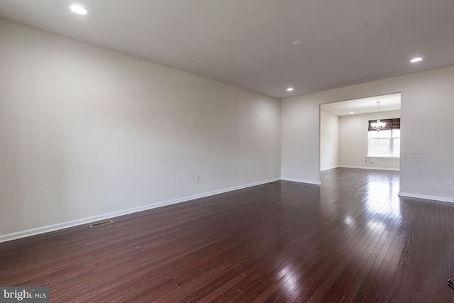 4251 Beech Dr, Nazareth, PA 18064 - empty room featuring a chandelier, dark wood-style floors, and recessed lighting