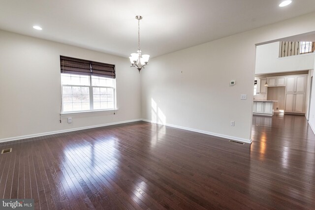 4251 Beech Dr, Nazareth, PA 18064 - unfurnished room with a chandelier, dark wood-style floors, and recessed lighting