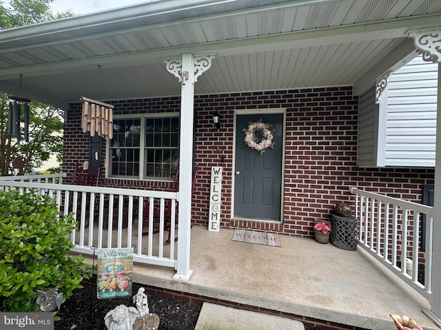 408 Lexington Way, Littlestown, PA 17340 - entrance to property with covered porch and brick siding