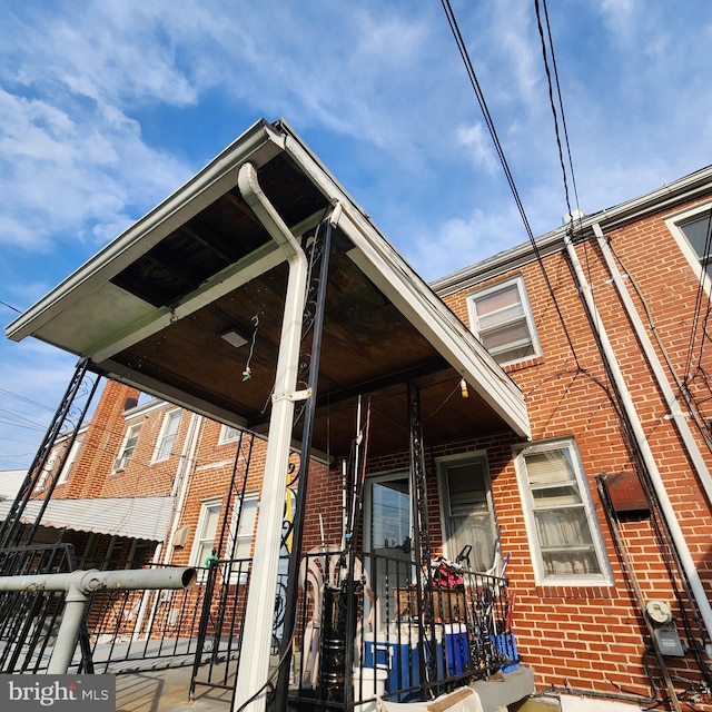 3648 Benson Ave, Baltimore, MD 21227 - exterior space with brick siding and a porch