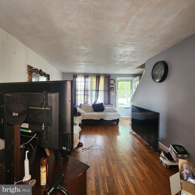 3648 Benson Ave, Baltimore, MD 21227 - living room featuring hardwood / wood-style flooring and a textured ceiling