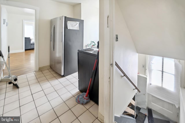 1711 W Union Blvd, Bethlehem, PA 18018 - kitchen featuring stainless steel refrigerator with ice dispenser, range with electric cooktop, and light tile patterned floors