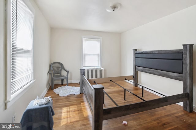 1711 W Union Blvd, Bethlehem, PA 18018 - bedroom with radiator heating unit and wood finished floors