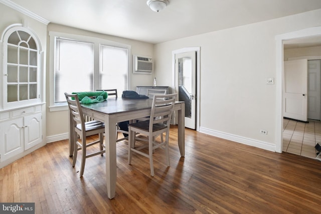 1711 W Union Blvd, Bethlehem, PA 18018 - dining room featuring an AC wall unit, healthy amount of natural light, and wood finished floors