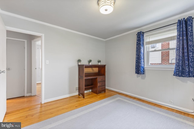 12703 Bluhill Rd, Silver Spring, MD 20906 - spare room featuring wood finished floors and ornamental molding