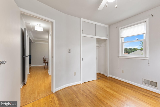 12703 Bluhill Rd, Silver Spring, MD 20906 - unfurnished bedroom featuring light wood finished floors, a closet, and a ceiling fan