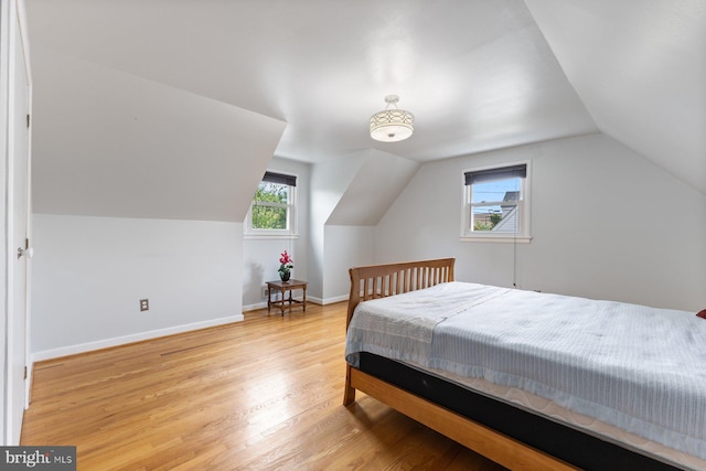 12703 Bluhill Rd, Silver Spring, MD 20906 - bedroom featuring lofted ceiling and light wood-style floors