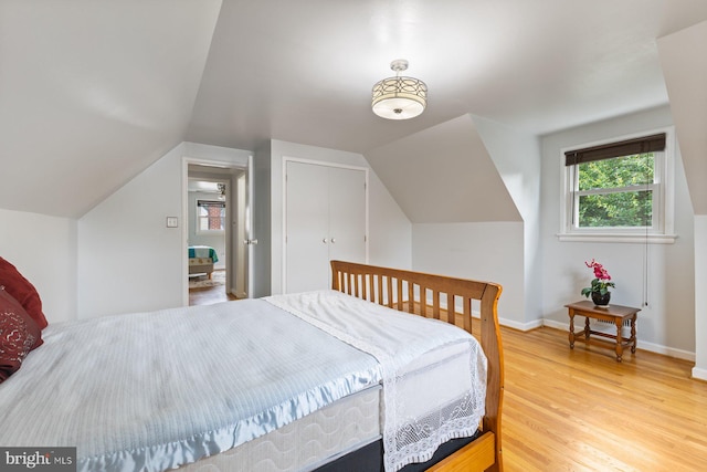 12703 Bluhill Rd, Silver Spring, MD 20906 - bedroom featuring light wood finished floors and lofted ceiling