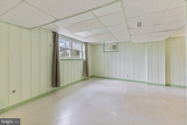 12703 Bluhill Rd, Silver Spring, MD 20906 - basement featuring tile patterned floors and a paneled ceiling