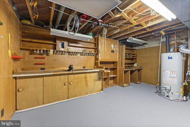 12703 Bluhill Rd, Silver Spring, MD 20906 - unfinished below grade area with water heater and a workshop area