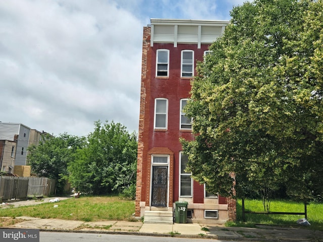 708 N Mount St, Baltimore, MD 21217 - view of front of home featuring brick siding