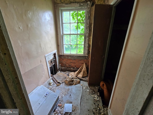 708 N Mount St, Baltimore, MD 21217 - unfurnished living room featuring healthy amount of natural light and a fireplace