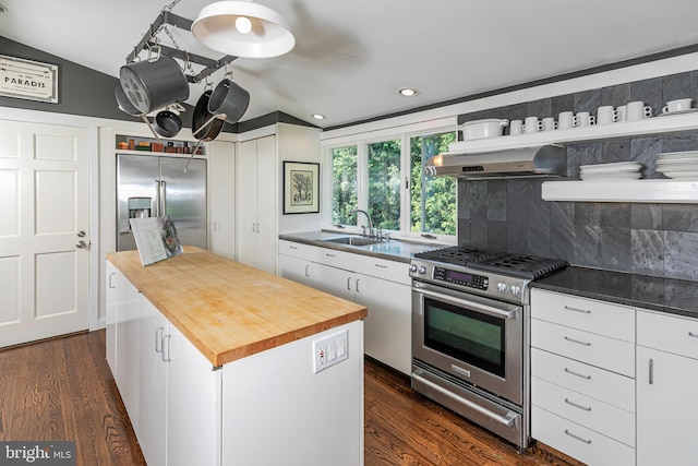697 Prospect Ave, Princeton, NJ 08540 - kitchen with stainless steel appliances, wood counters, open shelves, range hood, and recessed lighting