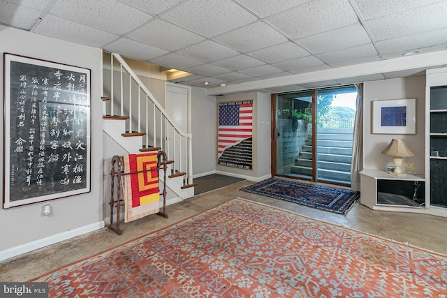 697 Prospect Ave, Princeton, NJ 08540 - foyer featuring concrete floors, stairs, and a paneled ceiling
