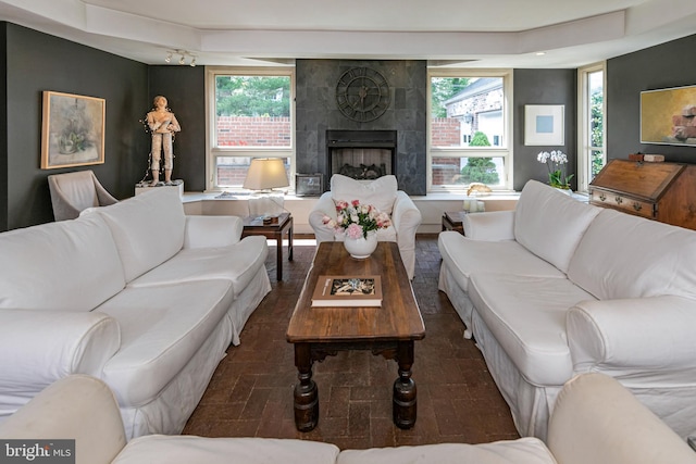 697 Prospect Ave, Princeton, NJ 08540 - living room featuring a tile fireplace and plenty of natural light