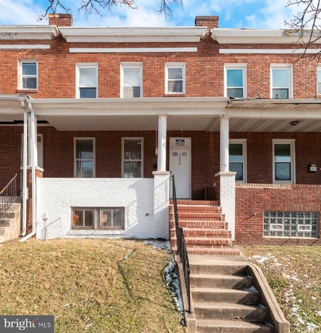 1539 N Payson St, Baltimore, MD 21217 - multi unit property with brick siding, covered porch, and a chimney