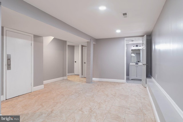 1539 N Payson St, Baltimore, MD 21217 - finished basement with baseboards and recessed lighting