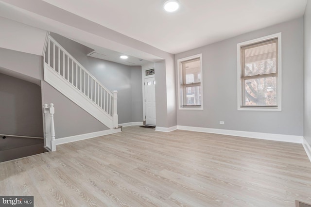 1539 N Payson St, Baltimore, MD 21217 - unfurnished living room with stairway, light wood-type flooring, and recessed lighting