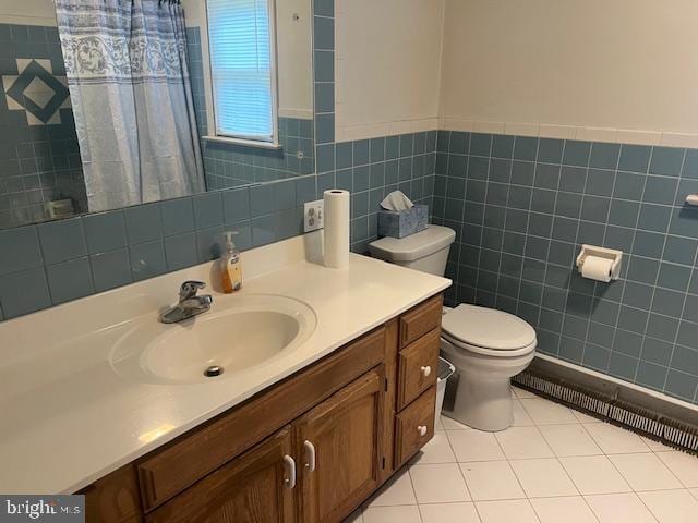 60 Buckwalter Rd, Royersford, PA 19468 - full bath with vanity, tile walls, tile patterned flooring, a shower with shower curtain, and wainscoting