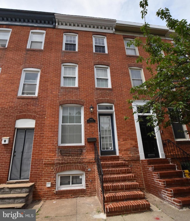 2902 Hudson St, Baltimore, MD 21224 - townhome / multi-family property with entry steps and brick siding