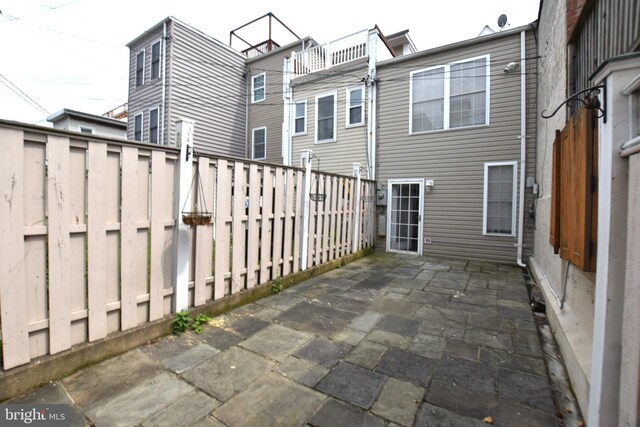 2902 Hudson St, Baltimore, MD 21224 - fenced backyard featuring a patio area