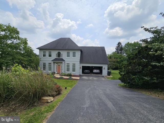 1012 Woodridge Rd, Red Lion, PA 17356 - colonial-style house with an attached garage and driveway