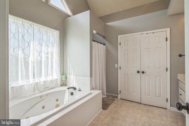 1012 Woodridge Rd, Red Lion, PA 17356 - full bath featuring a jetted tub, vanity, and curtained shower