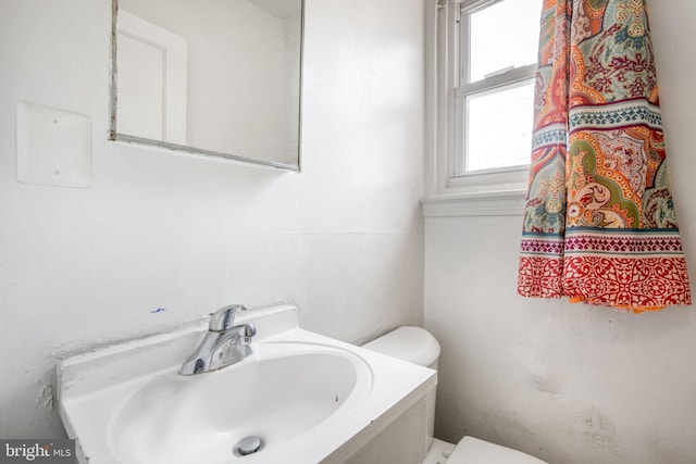 627 Forrester St SE, Washington, DC 20032 - bathroom featuring toilet and vanity
