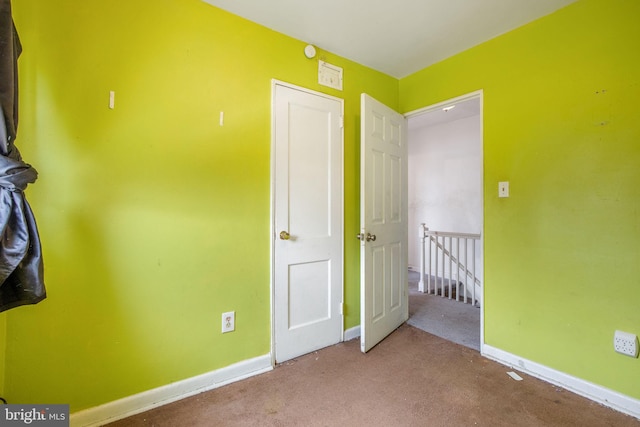 627 Forrester St SE, Washington, DC 20032 - unfurnished bedroom featuring baseboards