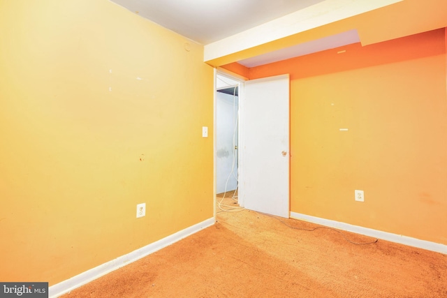 627 Forrester St SE, Washington, DC 20032 - empty room with baseboards and light carpet