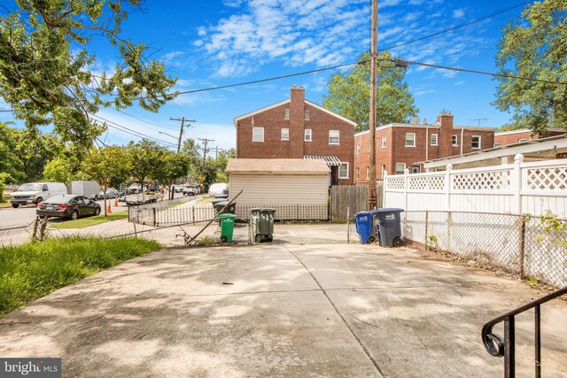 627 Forrester St SE, Washington, DC 20032 - view of side of home featuring a chimney