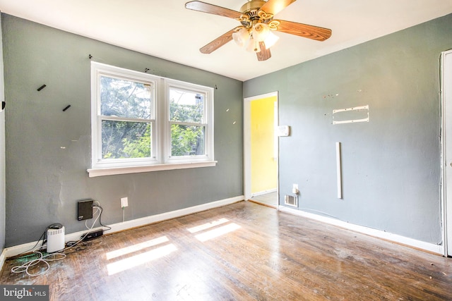 627 Forrester St SE, Washington, DC 20032 - unfurnished room with wood finished floors and a ceiling fan